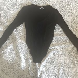 Black, long sleeve, v neck, snap body suit, M